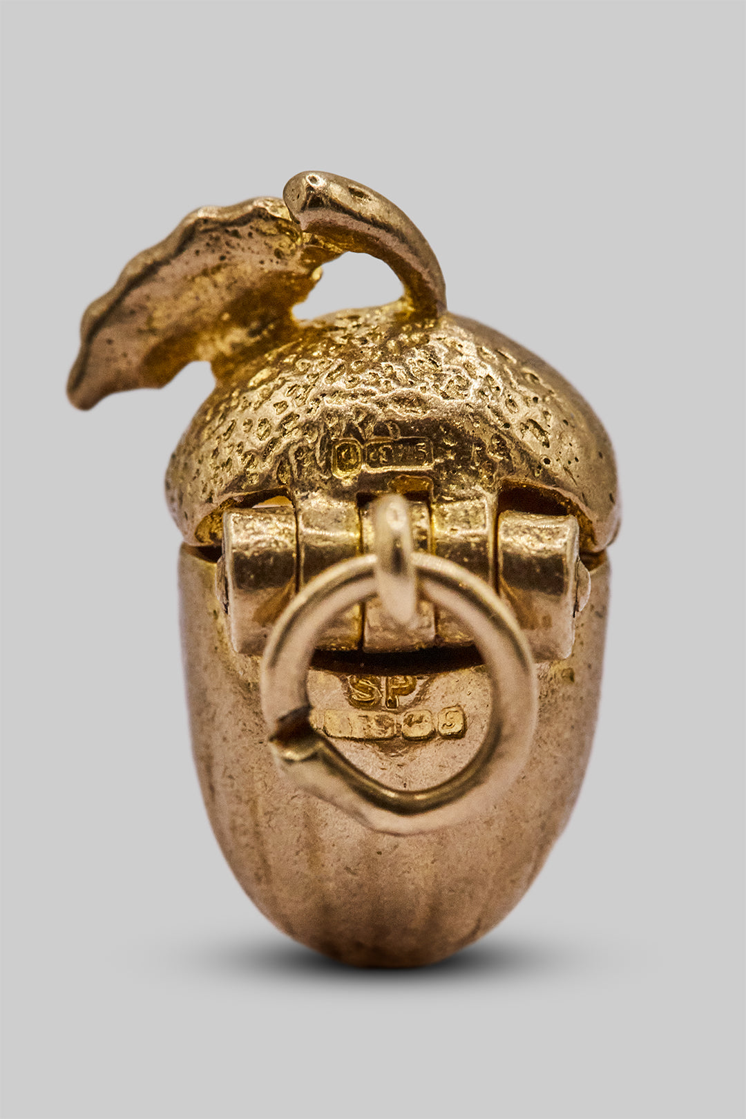 The Mischievous Golden Squirrel in an Acorn Opening Charm (9ct 375 Gold 1967)