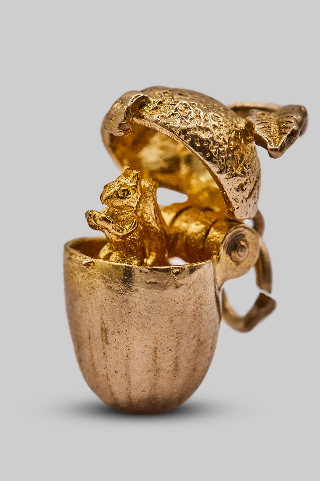 The Mischievous Golden Squirrel in an Acorn Opening Charm (9ct 375 Gold 1967)