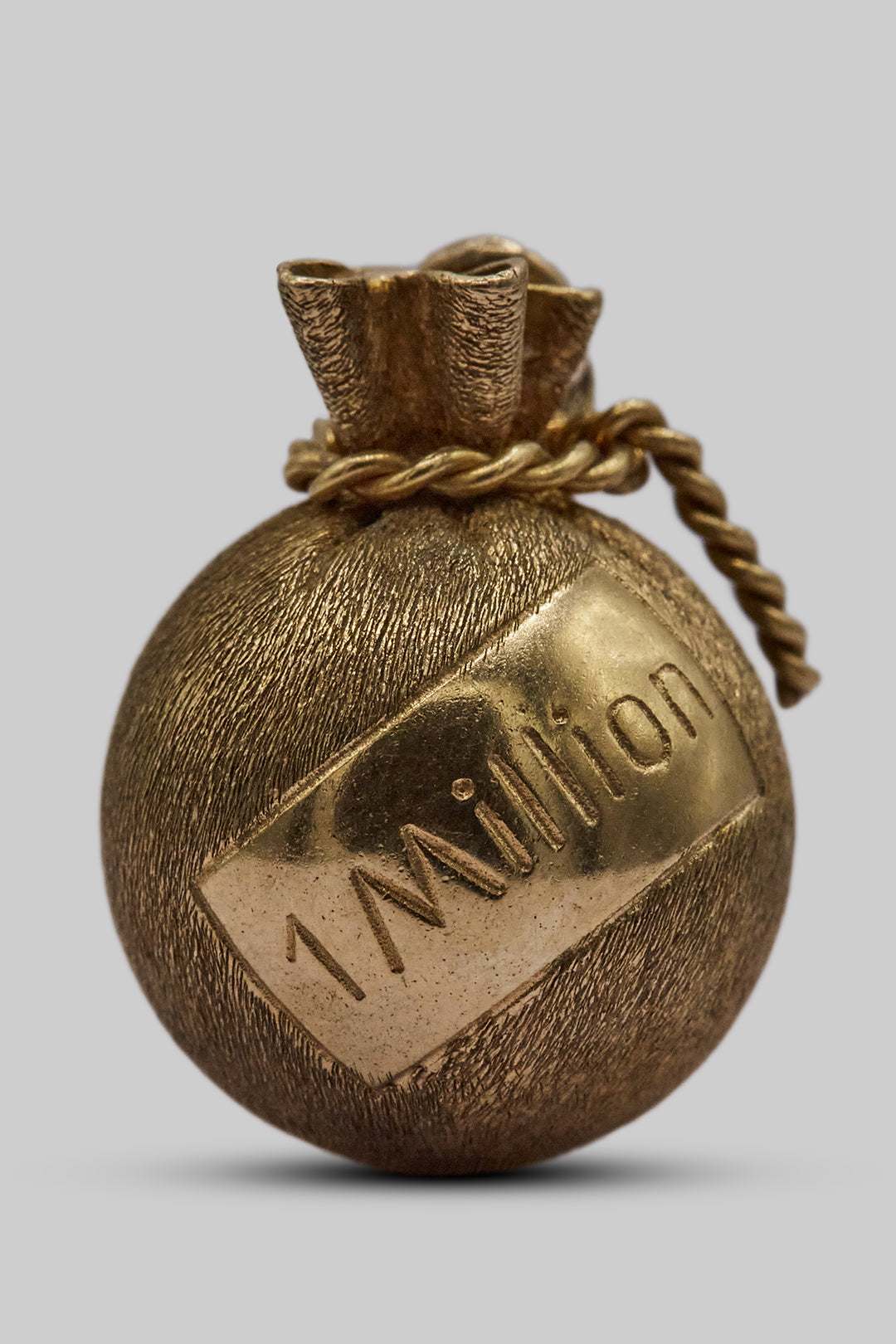 The Golden Millionaire’s Money Bag Charm (9ct 375 Gold, made in 1964)