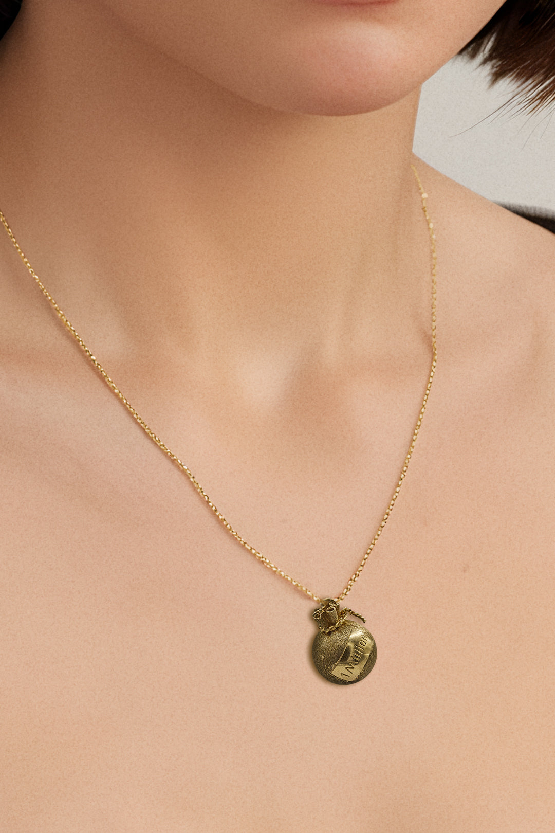 The Golden Millionaire’s Money Bag Charm (9ct 375 Gold, made in 1964)