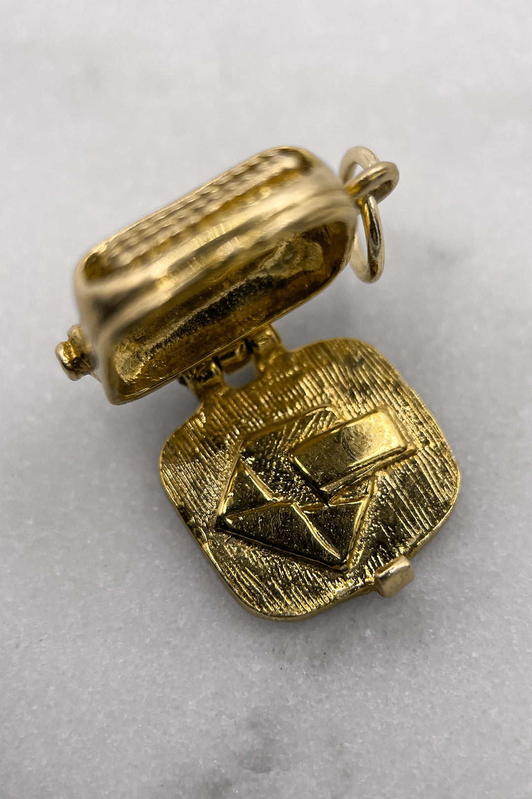 The Typewriter’s Secret Love Letter Charm (375 9ct gold, made in 1970 by Nuvo)