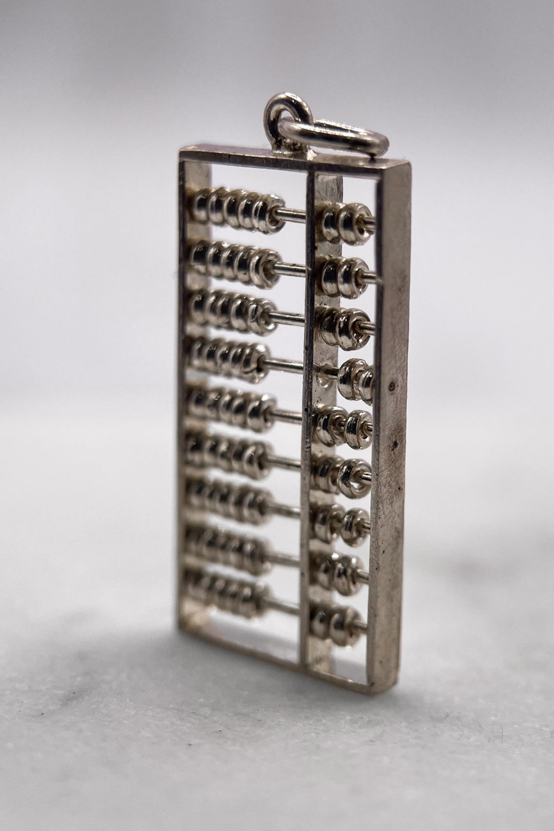 The Ancient Abacus of Civilisation Articulated Vintage Charm (925 Sterling Silver, made circa 1950 - 1970)