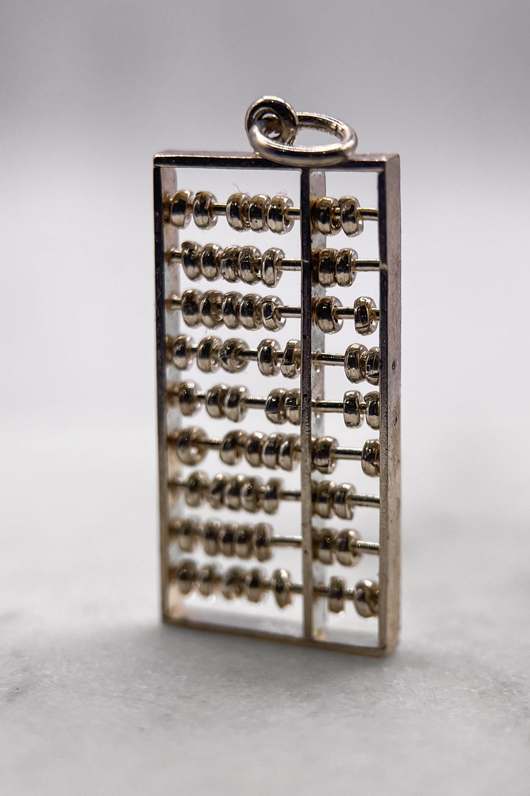 The Ancient Abacus of Civilisation Articulated Vintage Charm (925 Sterling Silver, made circa 1950 - 1970)