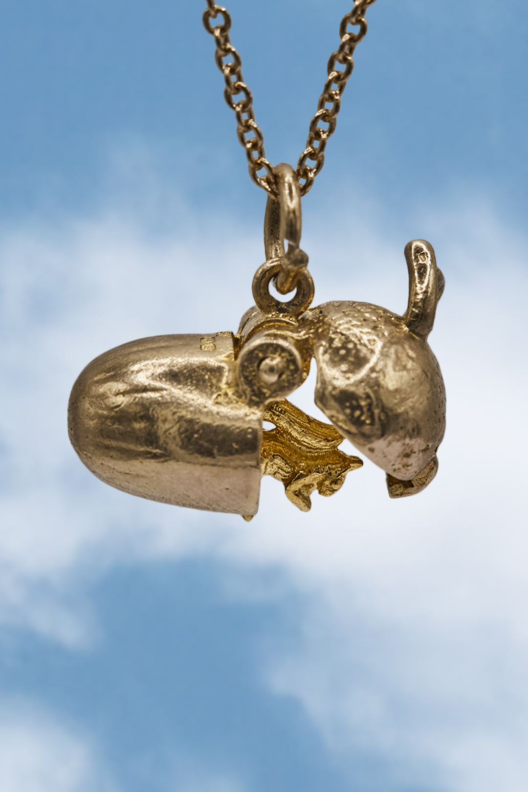The Mischievous Golden Squirrel in an Acorn Opening Charm (9ct 375 Gold 1967)