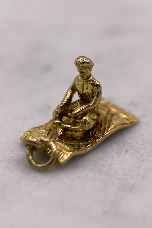 The Fairytale Aladdin on the Magical Carpet Charm (375 9ct gold, made in 1958)