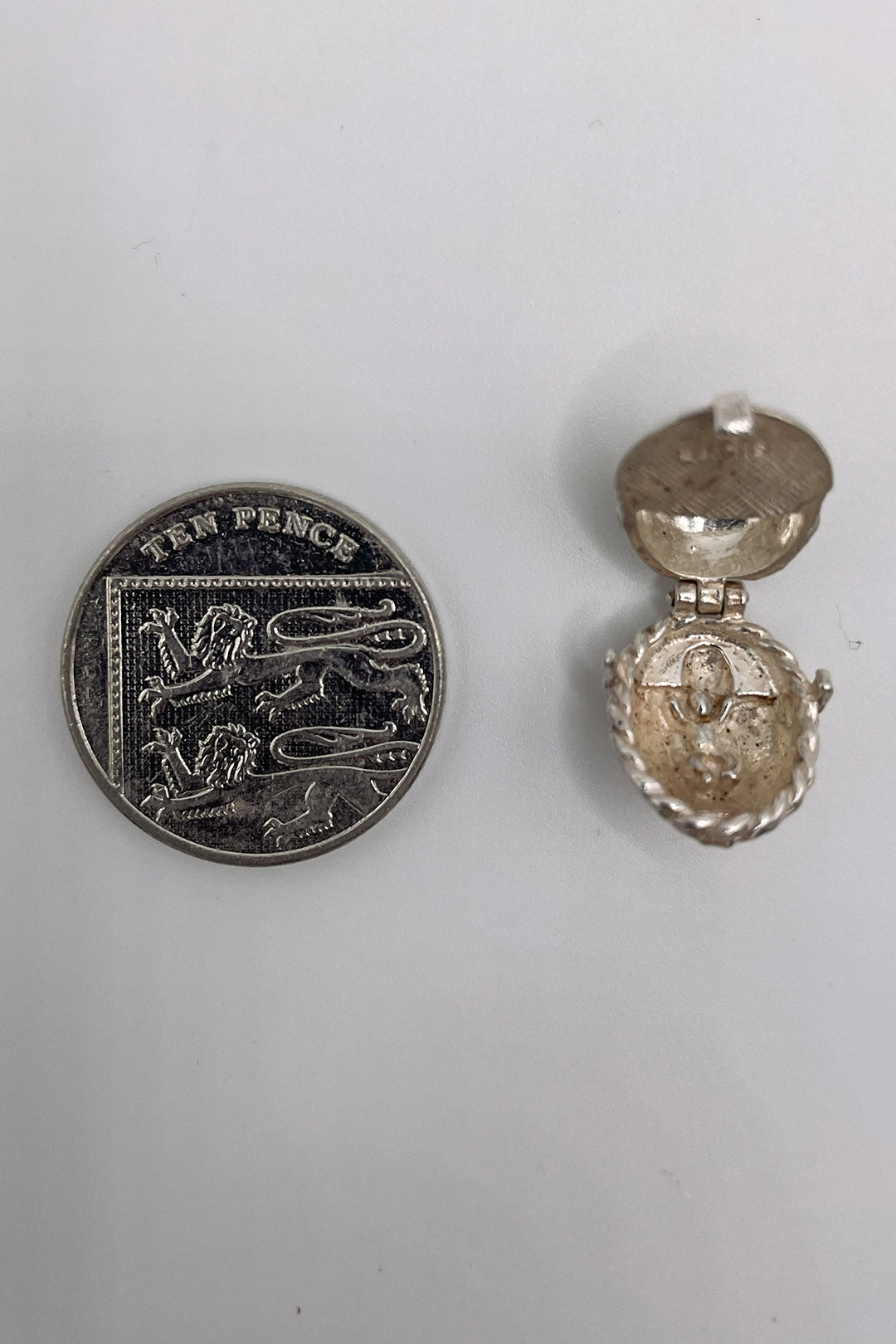 The Opening Baby In a Cradle charm (925 Sterling Silver made c 1950s - 1970s)