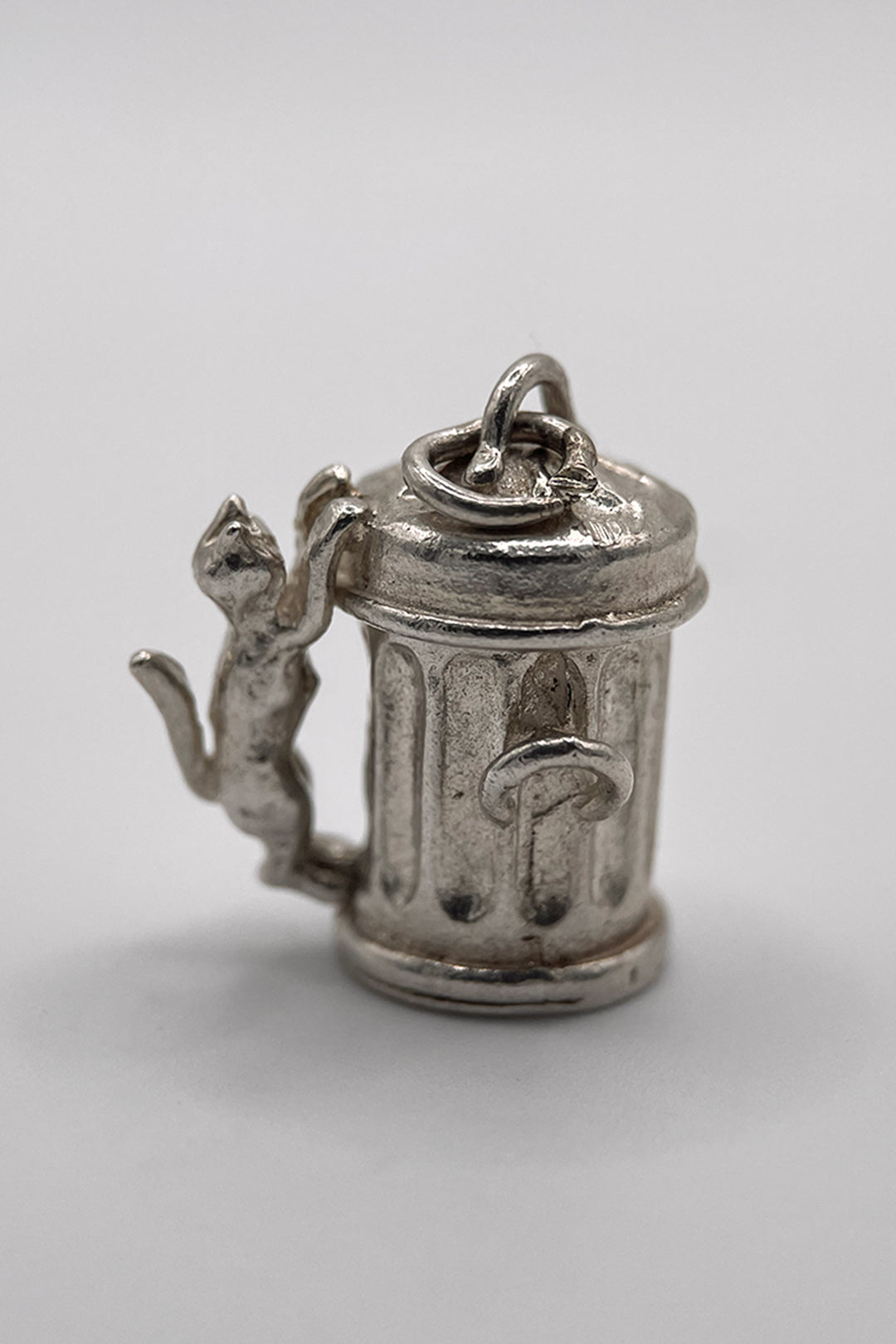 The Hungry and Mischievous Cat on the Opening Dustbin Vintage Charm (925 Sterling Silver, made circa 1950 - 1970)