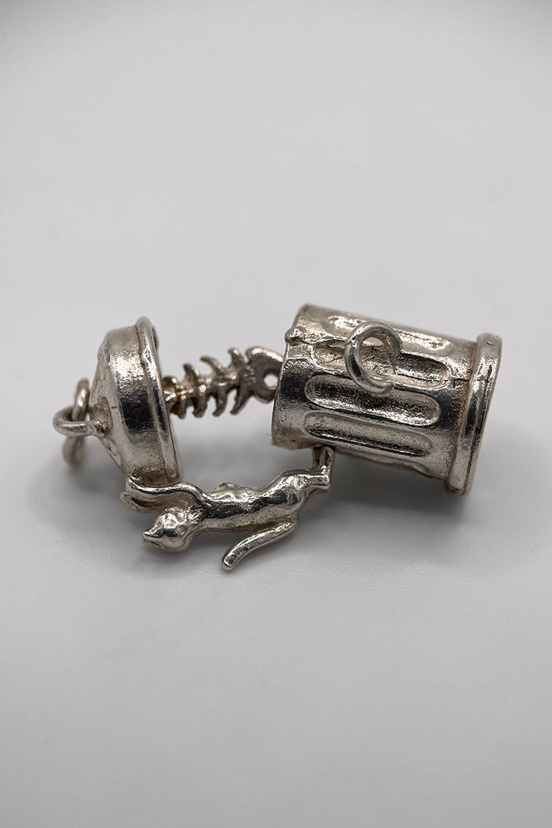 The Hungry and Mischievous Cat on the Opening Dustbin Vintage Charm (925 Sterling Silver, made circa 1950 - 1970)