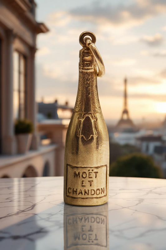 The Dazzling Golden Moët Et Chandon Bottle charm (9ct 375 Gold, made in 1951)