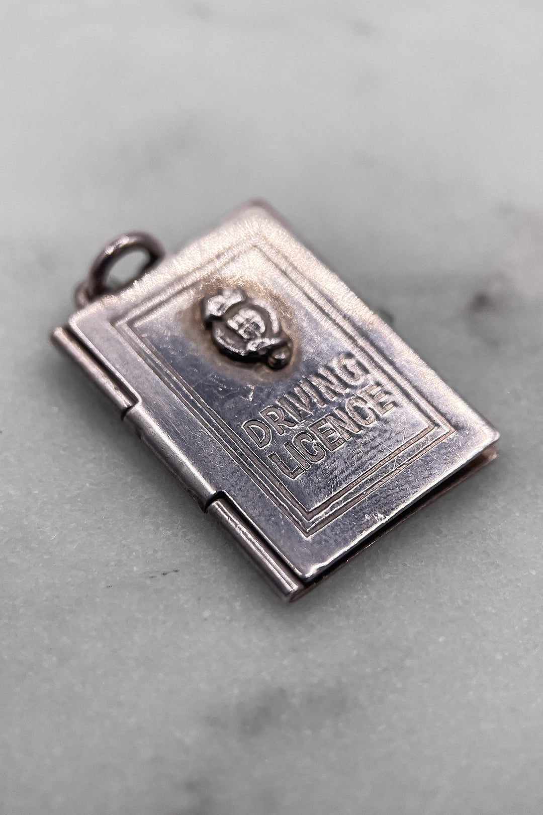 The Opening Drivers License of Freedom Vintage Charm (925 Sterling Silver, made circa 1950 - 1970)