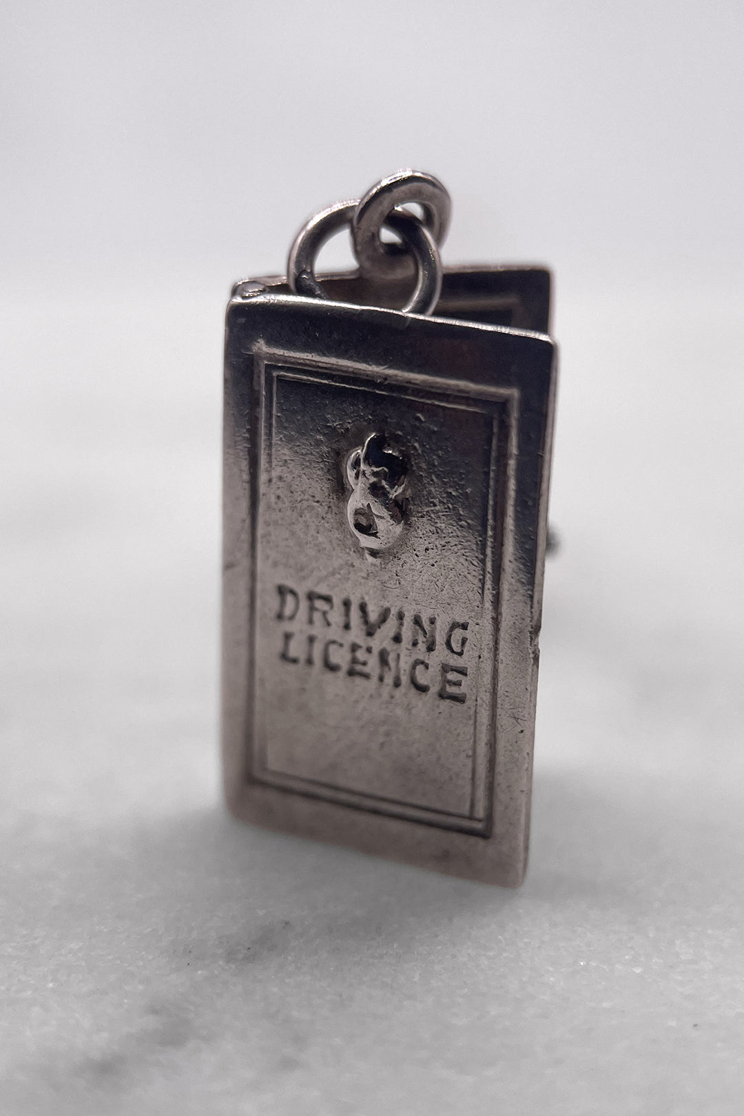 The Opening Drivers License of Freedom Vintage Charm (925 Sterling Silver, made circa 1950 - 1970)