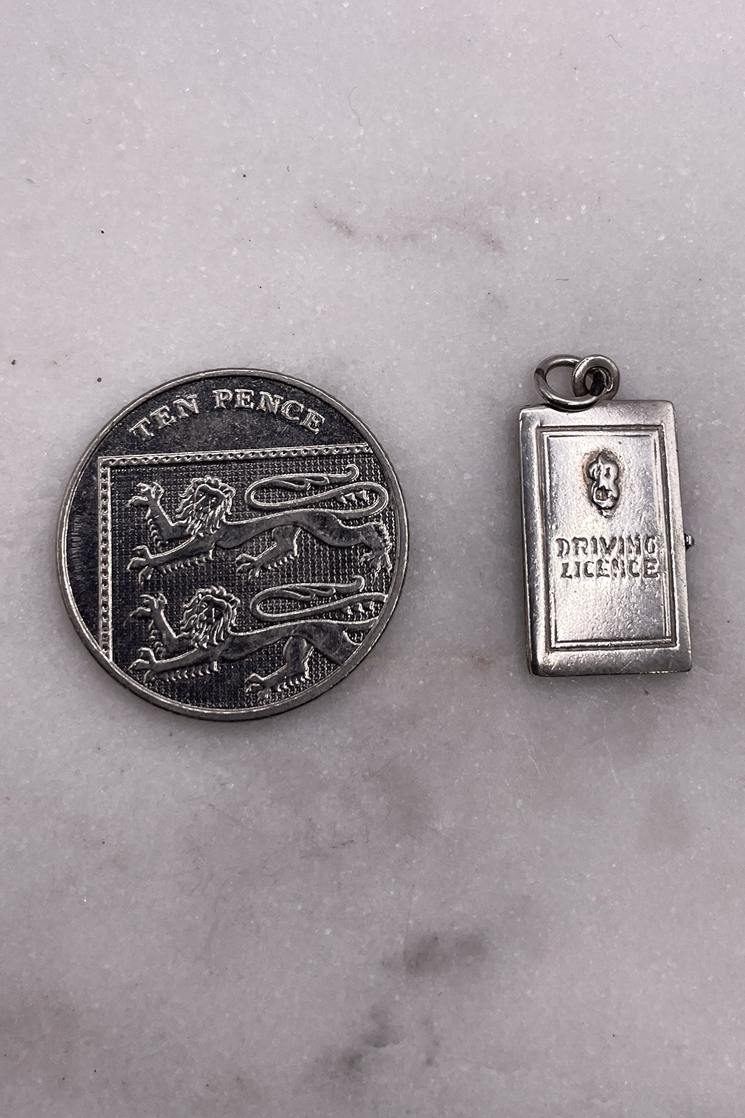 The Opening Drivers License of Freedom Vintage Charm (925 Sterling Silver, made circa 1950 - 1970)