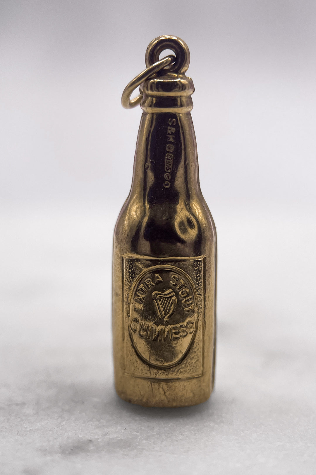 The Alcoholics Guinness Good Times Bottle Vinatge Charm (375 9ct gold, made in 1972)