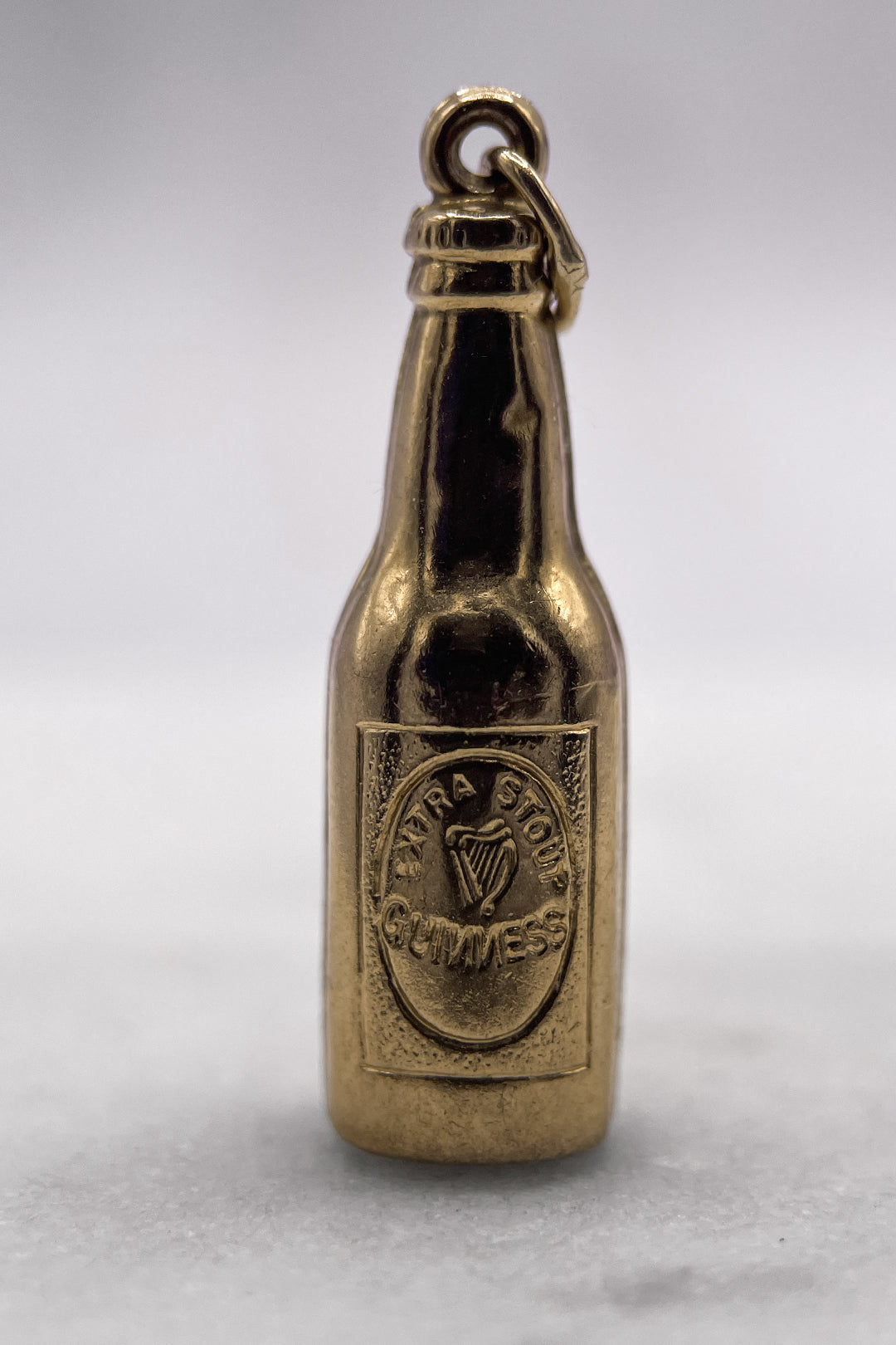 The Alcoholics Guinness Good Times Bottle Vinatge Charm (375 9ct gold, made in 1972)