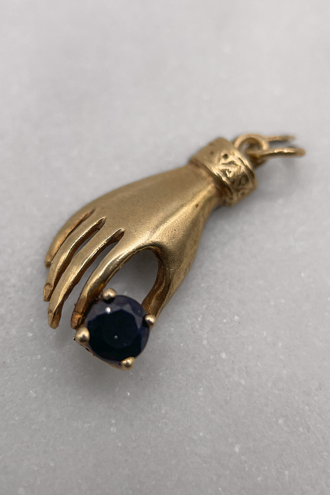 The Blessed Royal Hand of Blue Sapphire Vintage Charm (375 9ct gold, likely made in the 1970s)