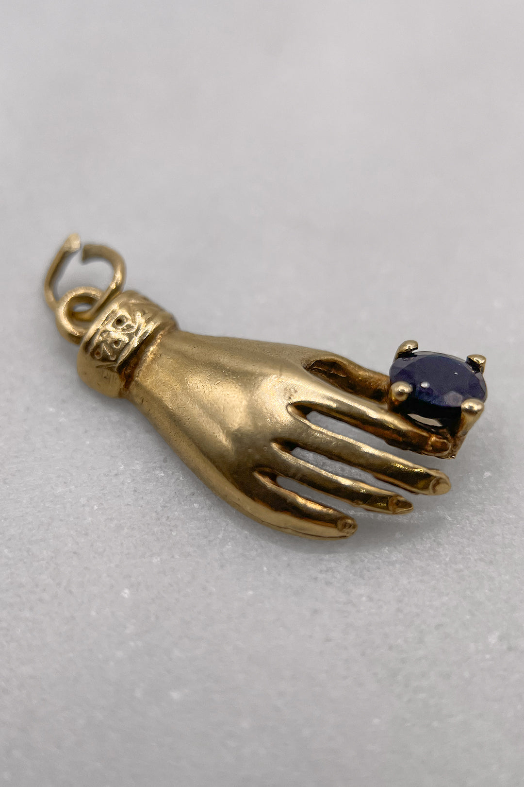 The Blessed Royal Hand of Blue Sapphire Vintage Charm (375 9ct gold, likely made in the 1970s)