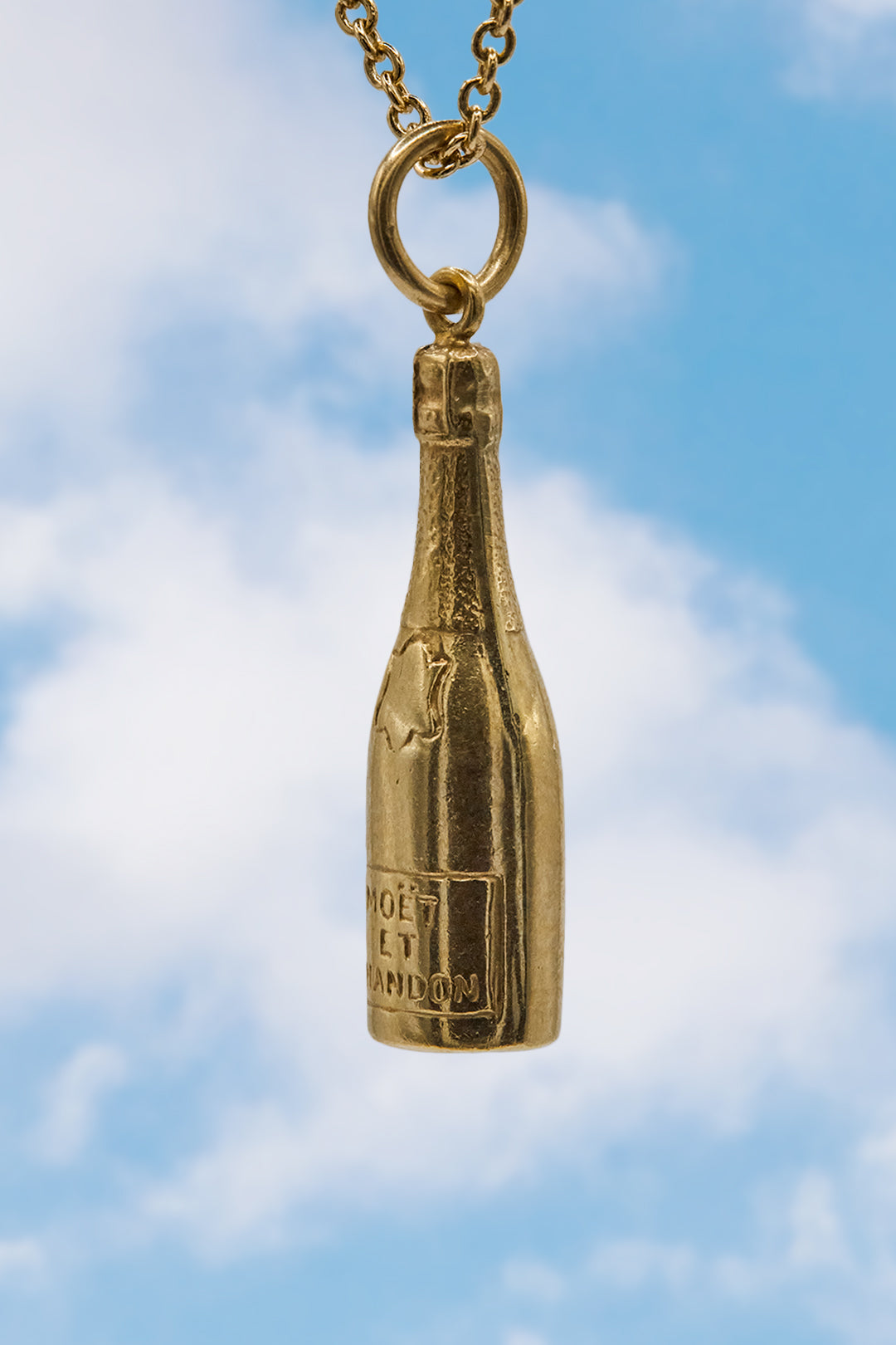 The Dazzling Golden Moët Et Chandon Bottle charm (9ct 375 Gold, made in 1951)