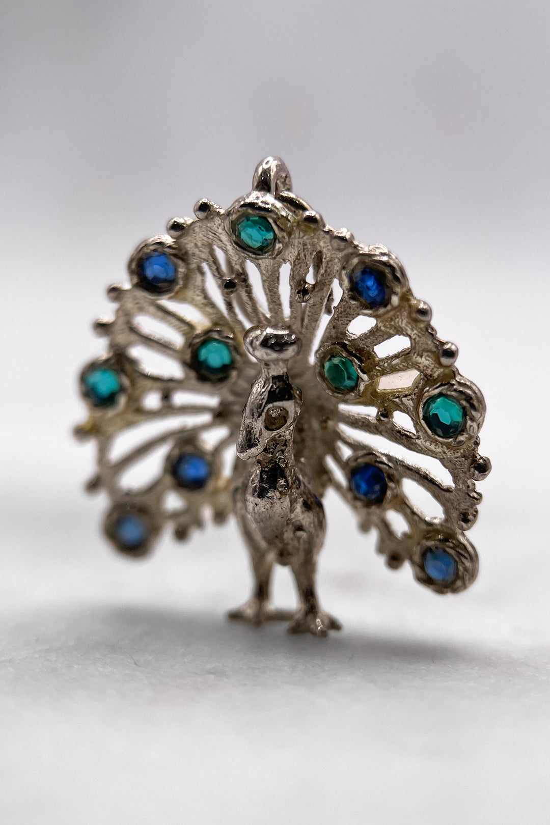 The Glamorous Peacocks Grand Display of Feathers Vintage Charm (925 Sterling Silver, made circa 1950 - 1970)