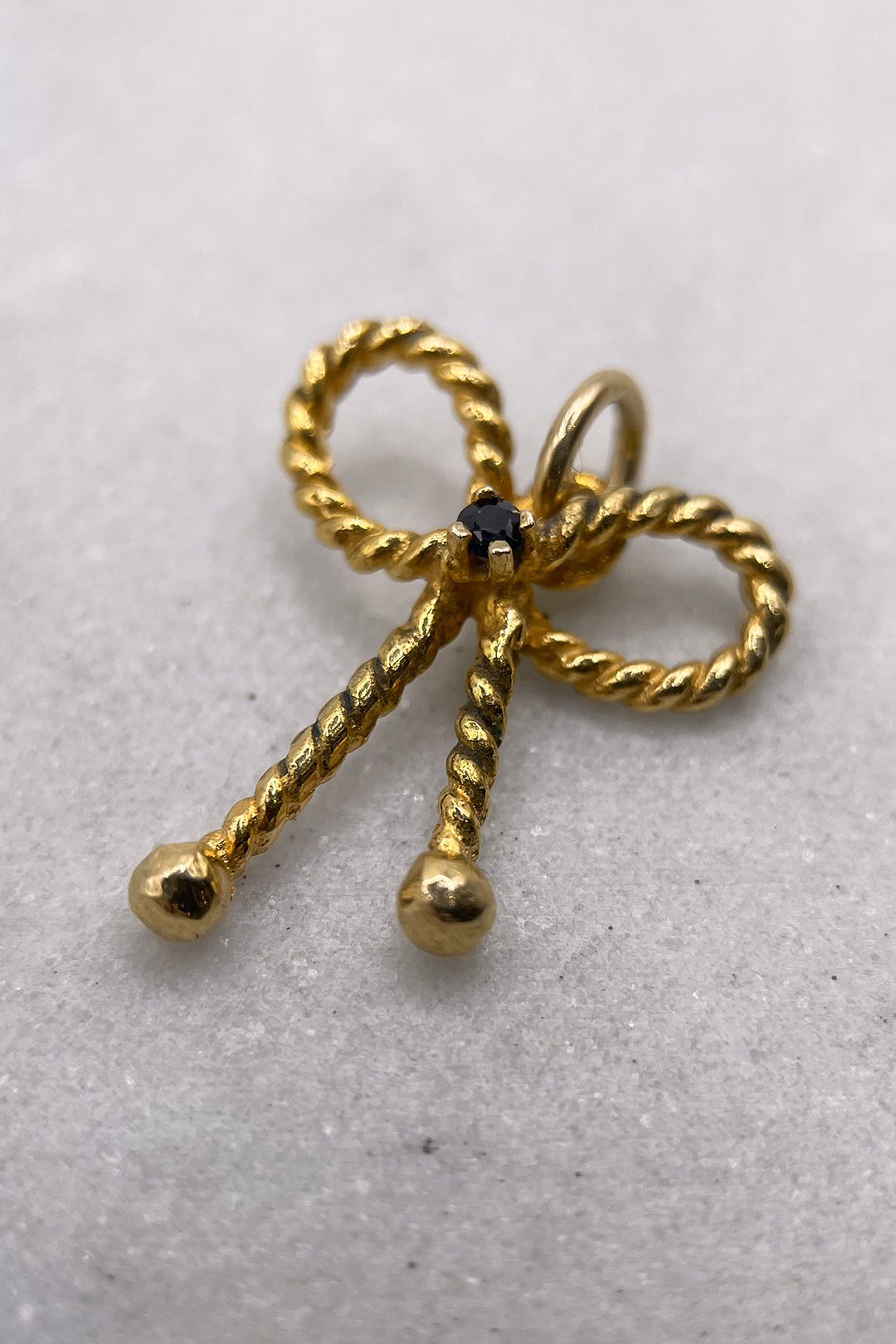 The Golden Ribbon of Grace Charm (375 9ct gold, made in 1977)