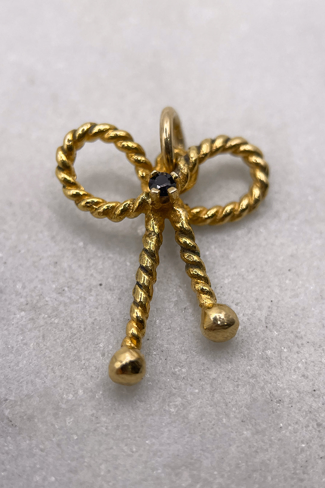 The Golden Ribbon of Grace Charm (375 9ct gold, made in 1977)