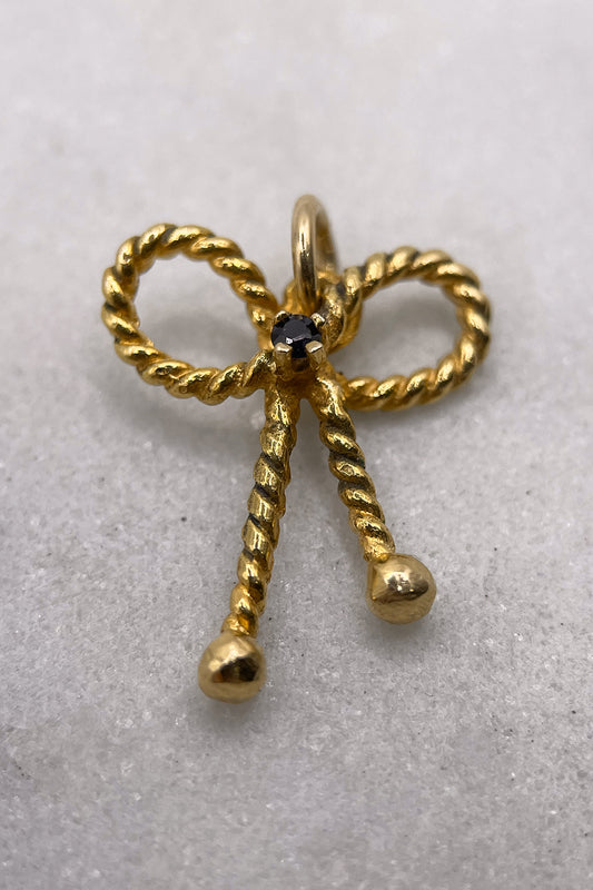 The Golden Ribbon of Grace Charm (375 9ct gold, made in 1977)