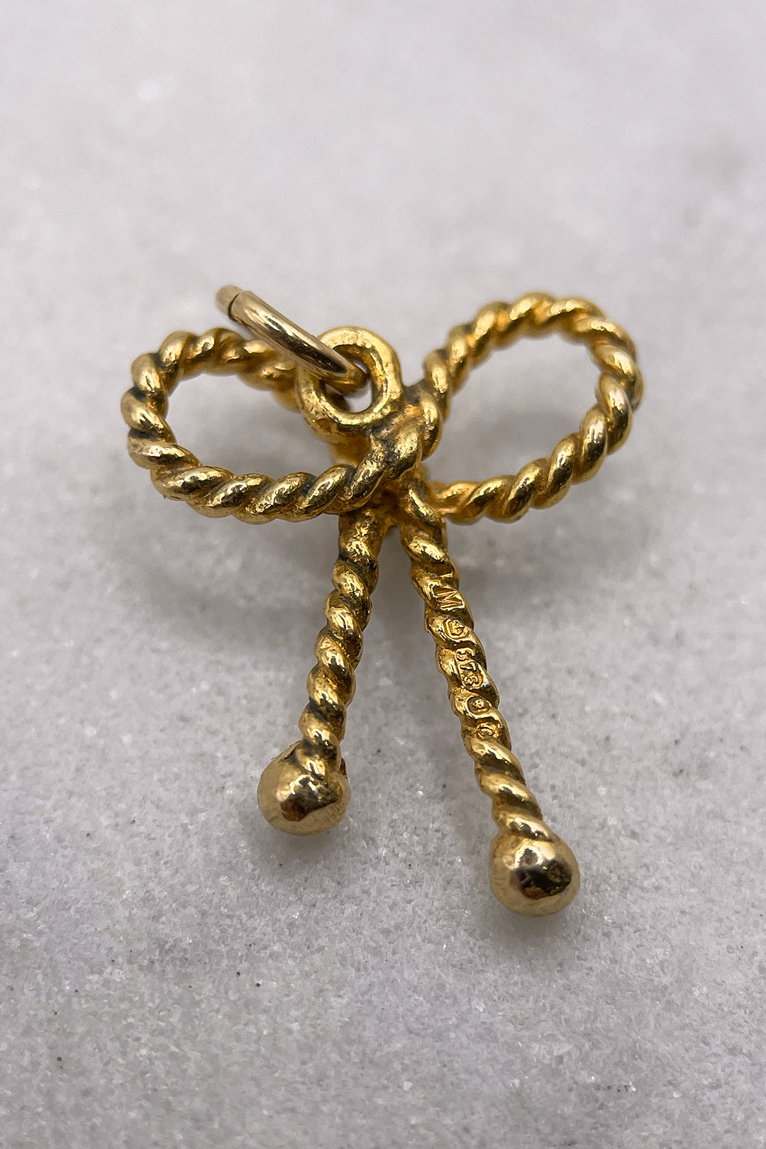 The Golden Ribbon of Grace Charm (375 9ct gold, made in 1977)