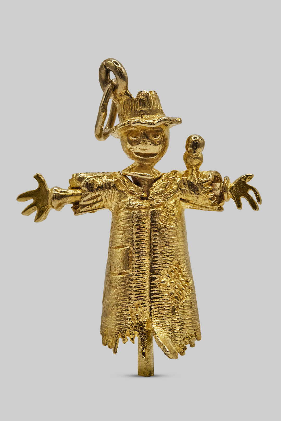 The Articulated Guardian Scarecrow Charm (375, 9ct gold made in 1972)