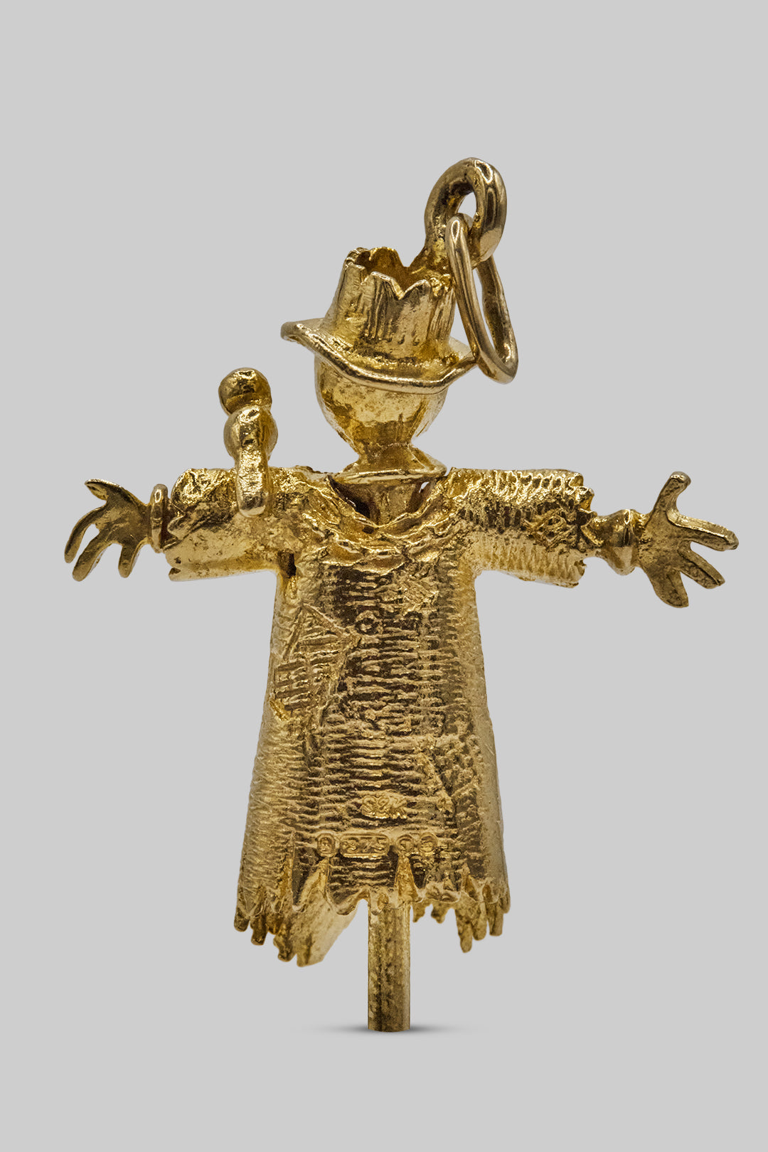 The Articulated Guardian Scarecrow Charm (375, 9ct gold made in 1972)