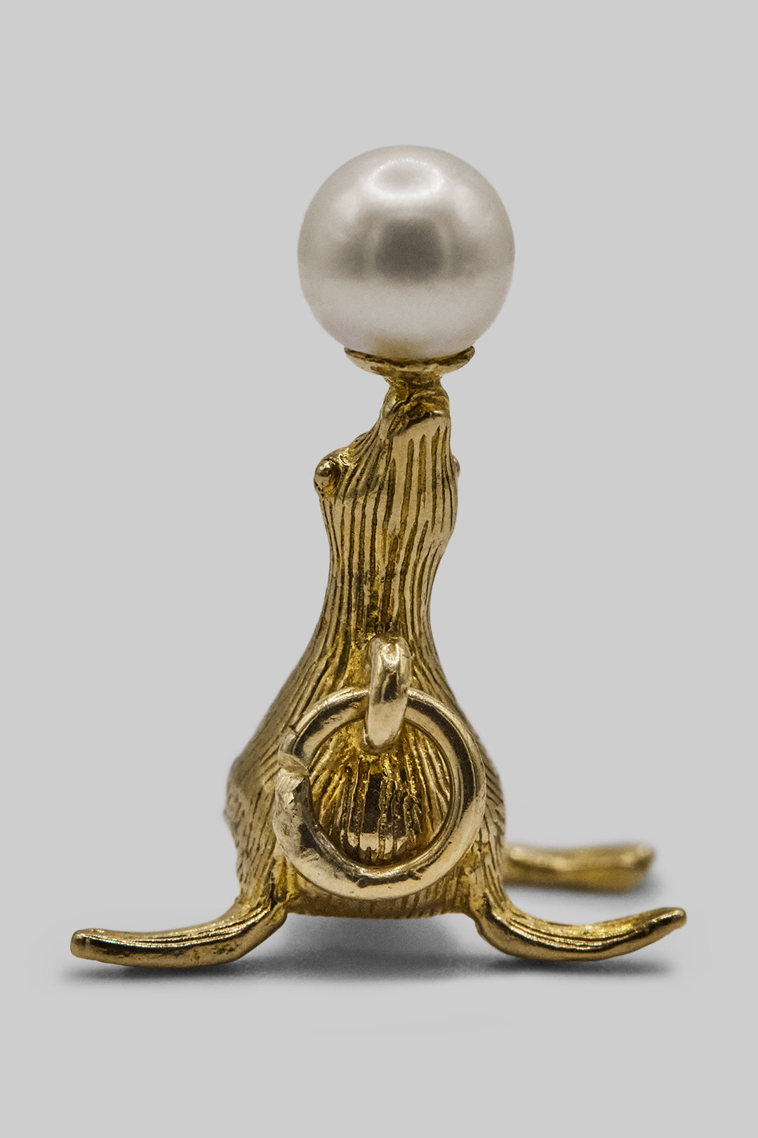The Pearl Balancing Seal Charm (375 9ct gold, made in 1967)