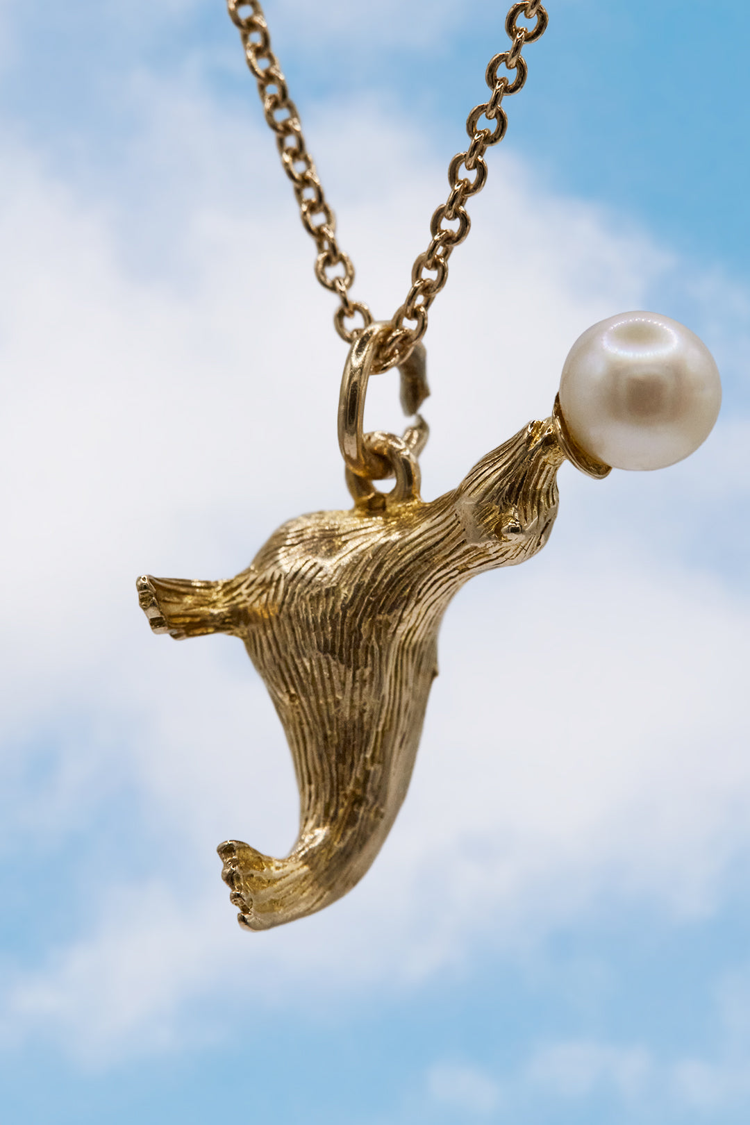 The Pearl Balancing Seal Charm (375 9ct gold, made in 1967)