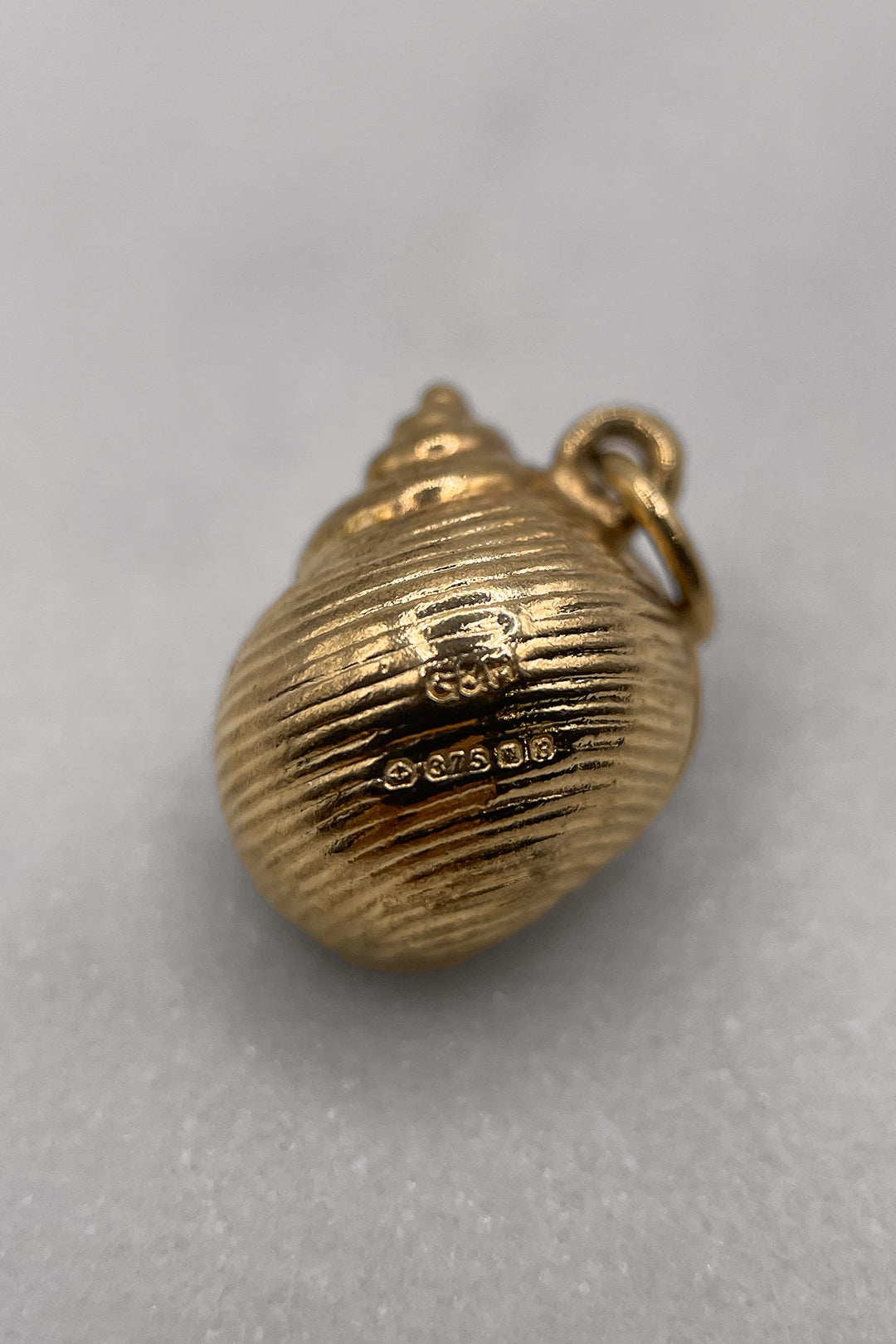 The Golden Seashell of the Tides Charm (375 9ct gold, made in 1976)