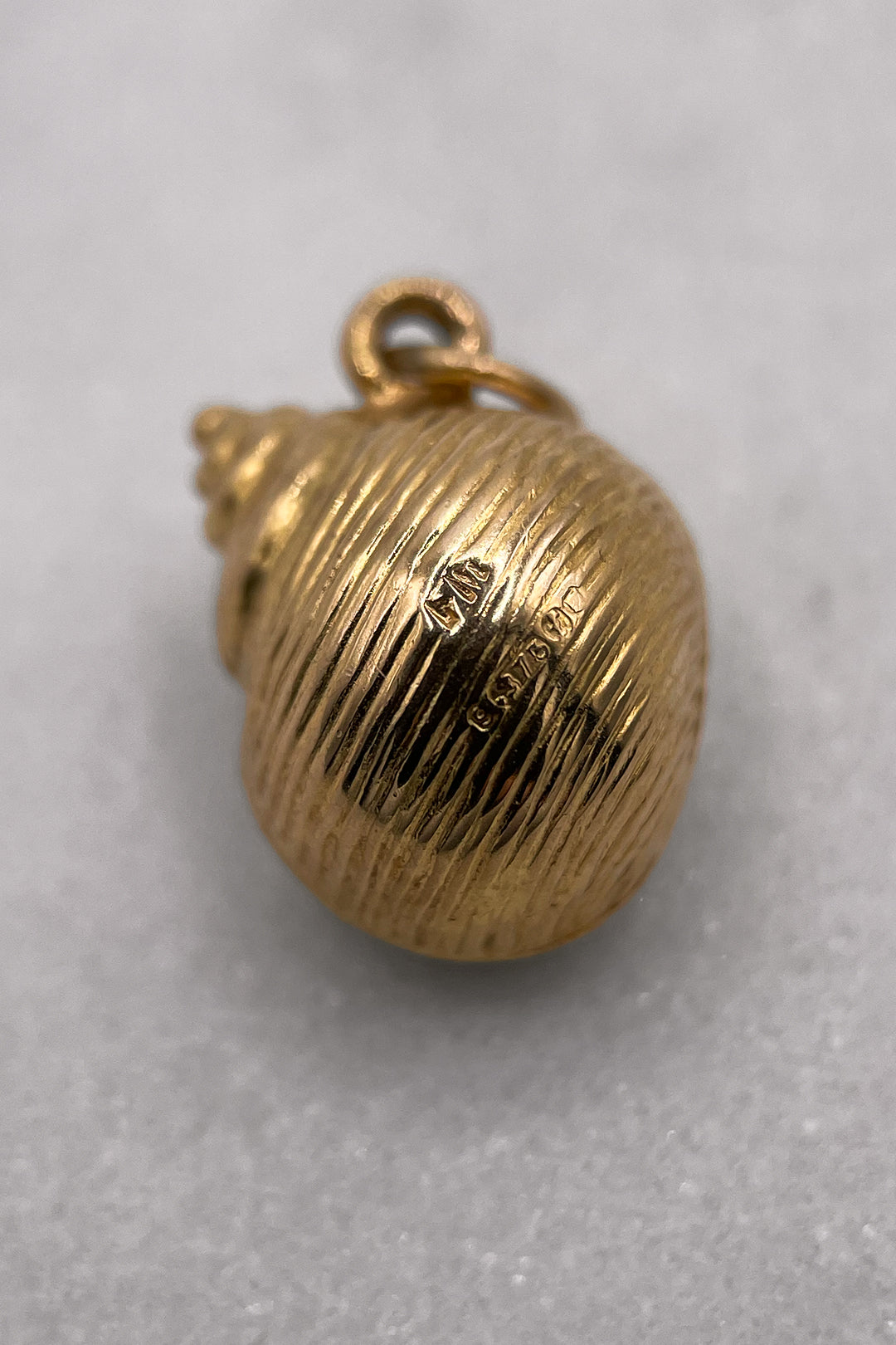 The Golden Seashell of the Tides Charm (375 9ct gold, made in 1961)