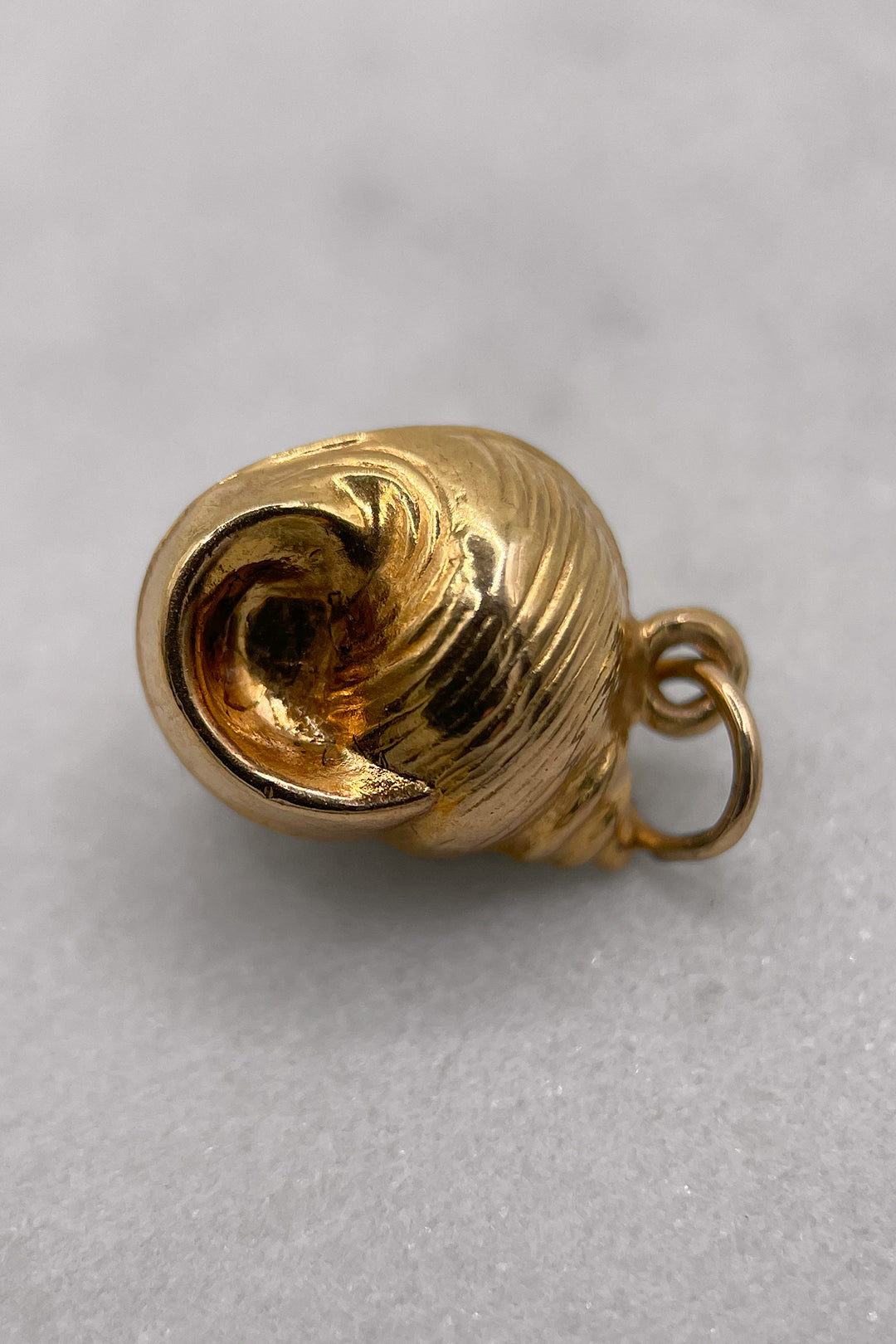 The Golden Seashell of the Tides Charm (375 9ct gold, made in 1961)