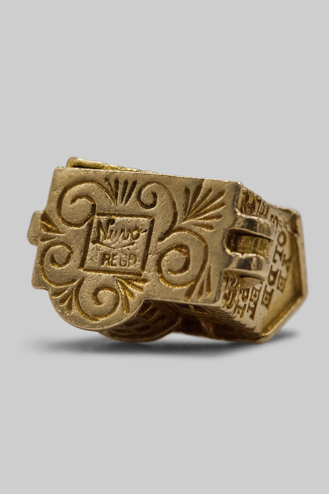 The Village British Sweet Shop Opening Charm  (375 9ct gold, made in the 1960s)