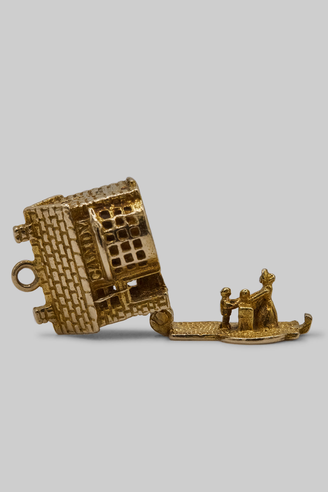 The Village British Sweet Shop Opening Charm  (375 9ct gold, made in the 1960s)