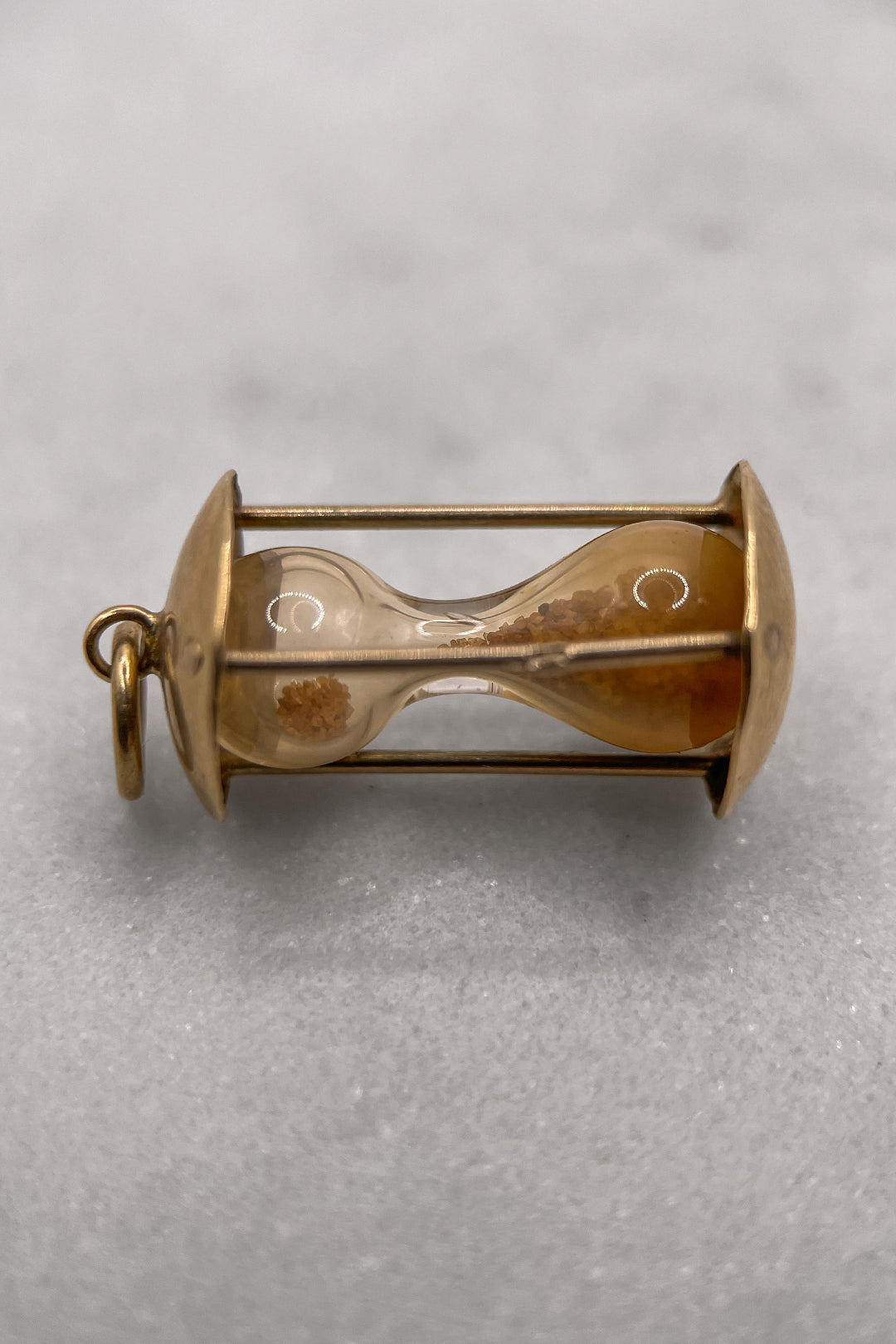 The Timekeeping Hourglass of Eternity Charm (375 9ct gold, made in the 1960s)