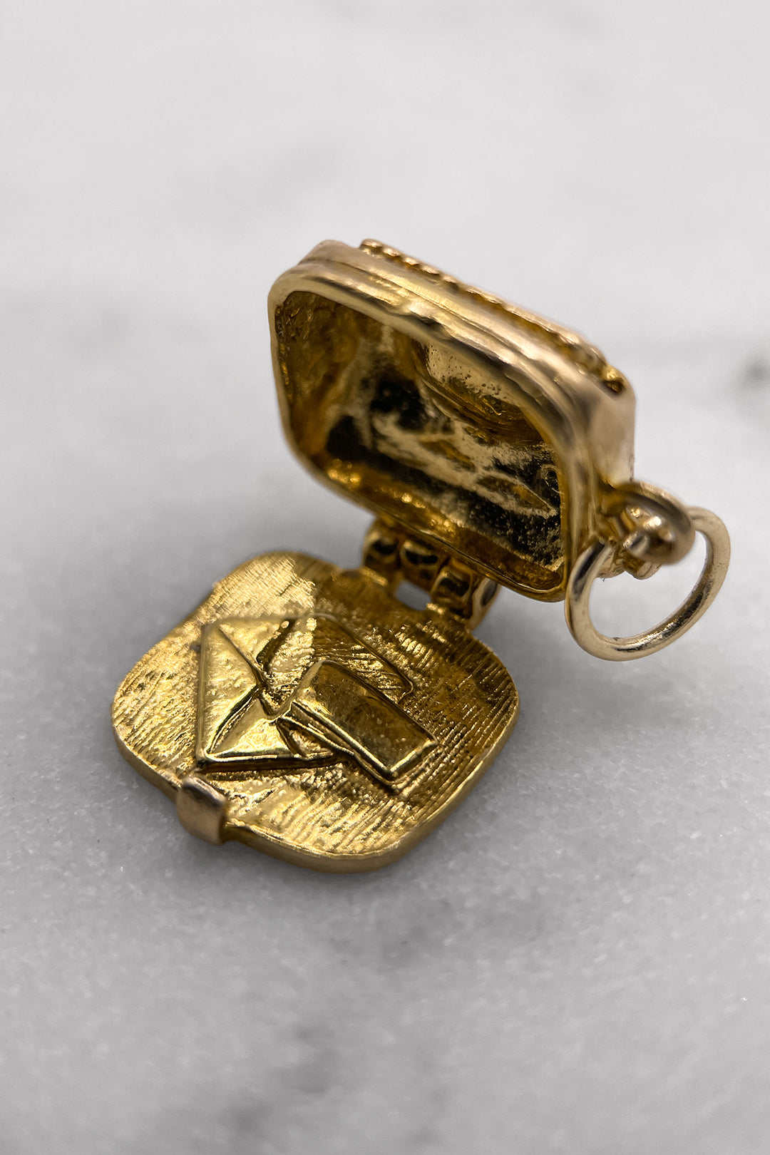 The Typewriter’s Secret Love Letter Charm (375 9ct gold, made in 1970 by Nuvo)