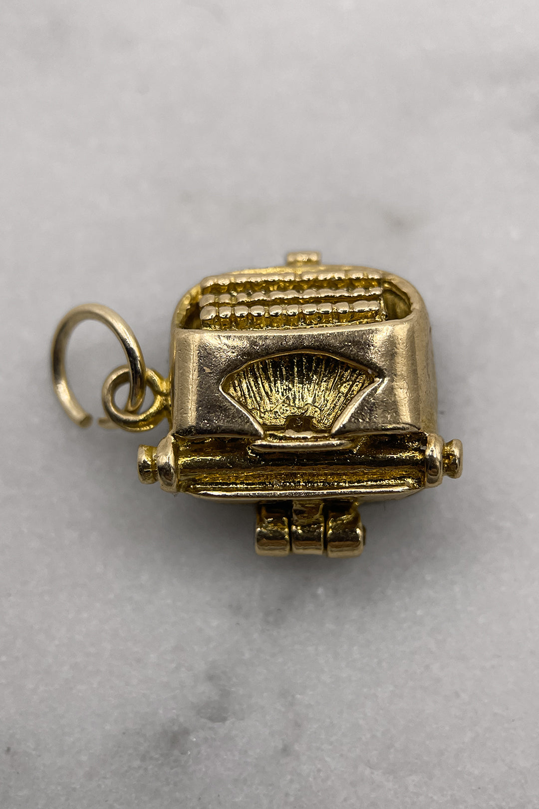 The Typewriter’s Secret Love Letter Charm (375 9ct gold, made in 1970 by Nuvo)