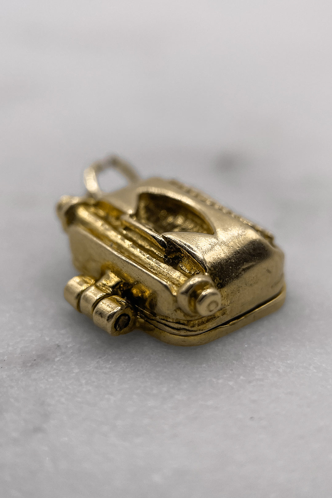 The Typewriter’s Secret Love Letter Charm (375 9ct gold, made in 1970 by Nuvo)