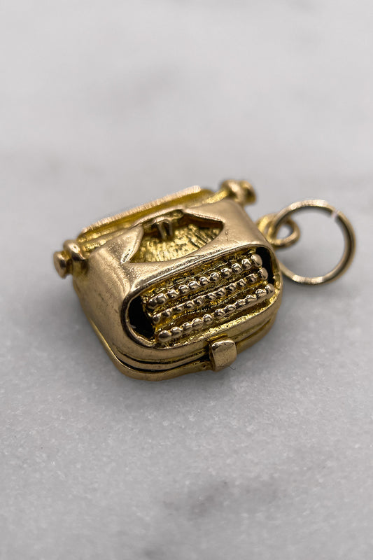 The Typewriter’s Secret Love Letter Charm (375 9ct gold, made in 1970 by Nuvo)