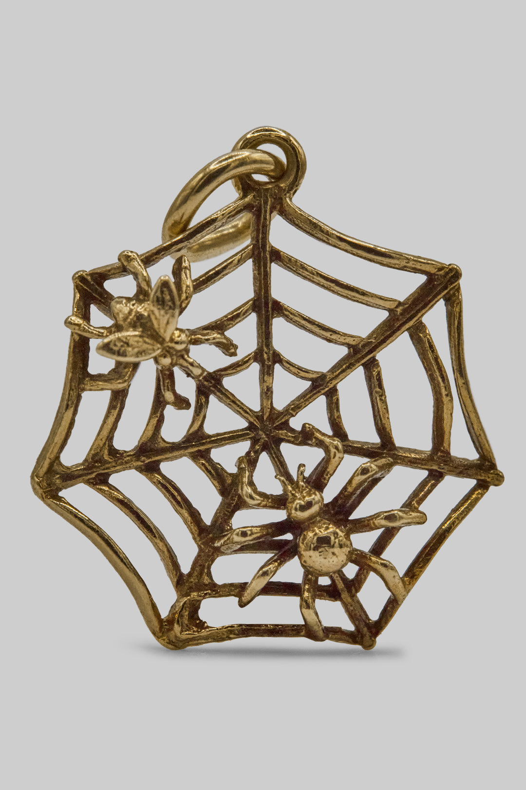 The Spooky Spiders Web Charm (375 9ct gold, made in 1972)
