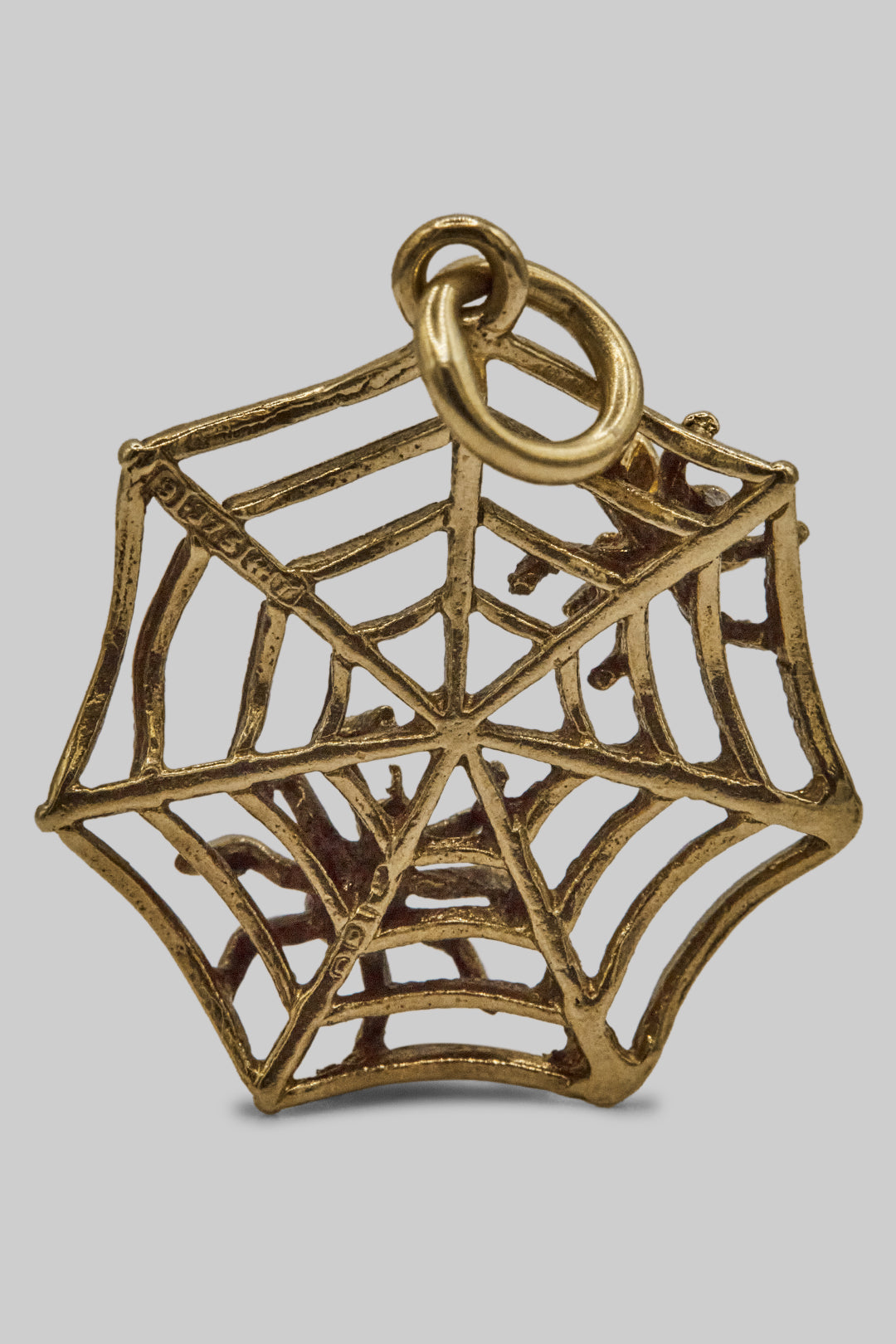 The Spooky Spiders Web Charm (375 9ct gold, made in 1972)
