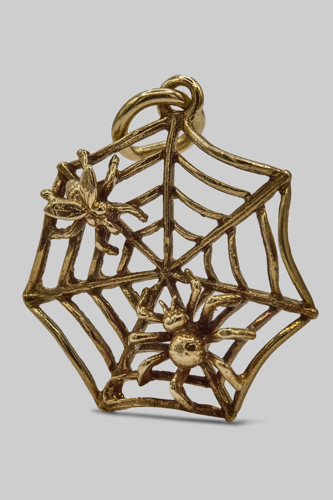 The Spooky Spiders Web Charm (375 9ct gold, made in 1972)